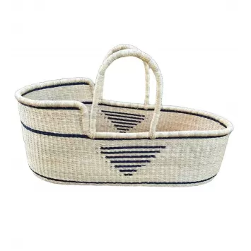A handwoven tan baby Moses basket or bassinet with a black geometric central pattern and black borders