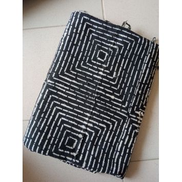Top view of a folded black and white Bogolan African Mudcloth Fabric Piece