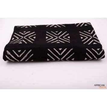 Black and white mudcloth that has  folded