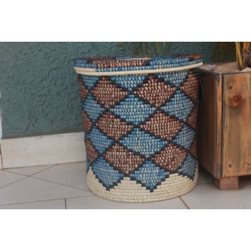 A multi-colored Kitenge laundry basket covered with a lid