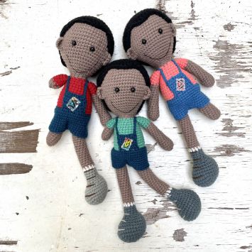 Flatlay of assorted Differently Abled Boy dolls