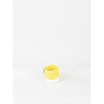 Top view of a yellow basket with a white bottom