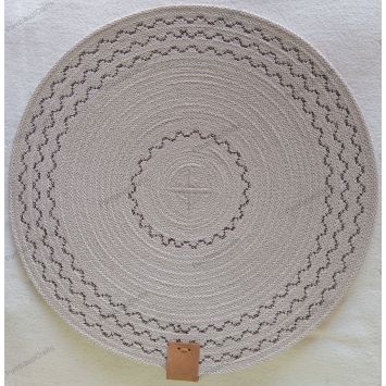 Top view showing a silver 12" embroidered cotton placemat