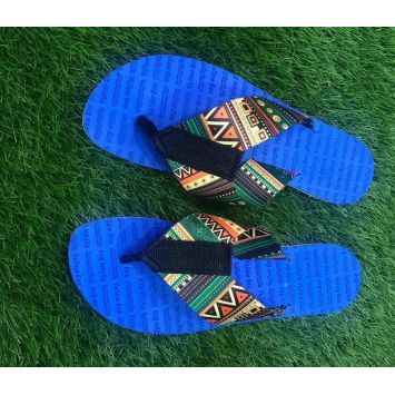 African patterned leather strap thong or flip-flop shoes with blue bases.