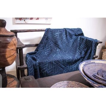 Front view of an Indigo Handwoven Bongolan Mudcloth covering a chair