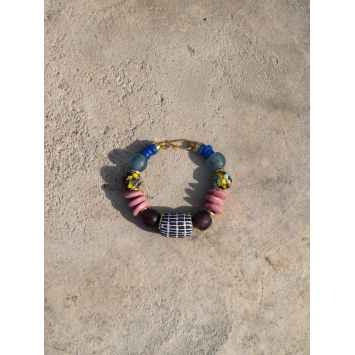 Flatlay of a multi-colored Hene Bracelet on the floor